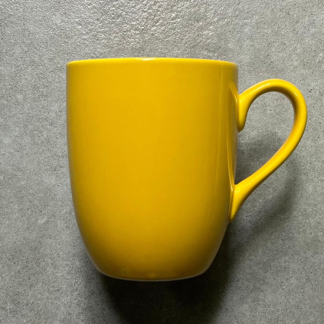 Yellow porcelain mug
